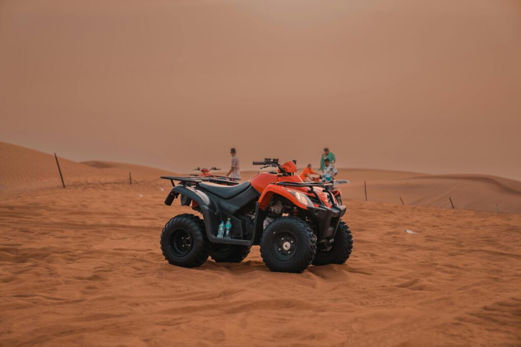 Dubai-Red-Dunes-by-Quad-Bike-Camel-Ride-Sandboarding-and-BBQ